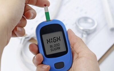 Critical care specialist monitoring diabetic emergency patient in ICU with medical equipment