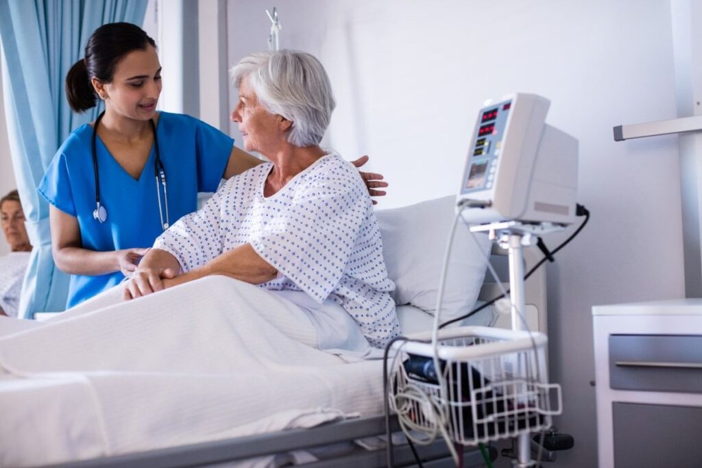 Doctor conducting post-ICU follow-up consultation at The Critical Care Physician Pune.